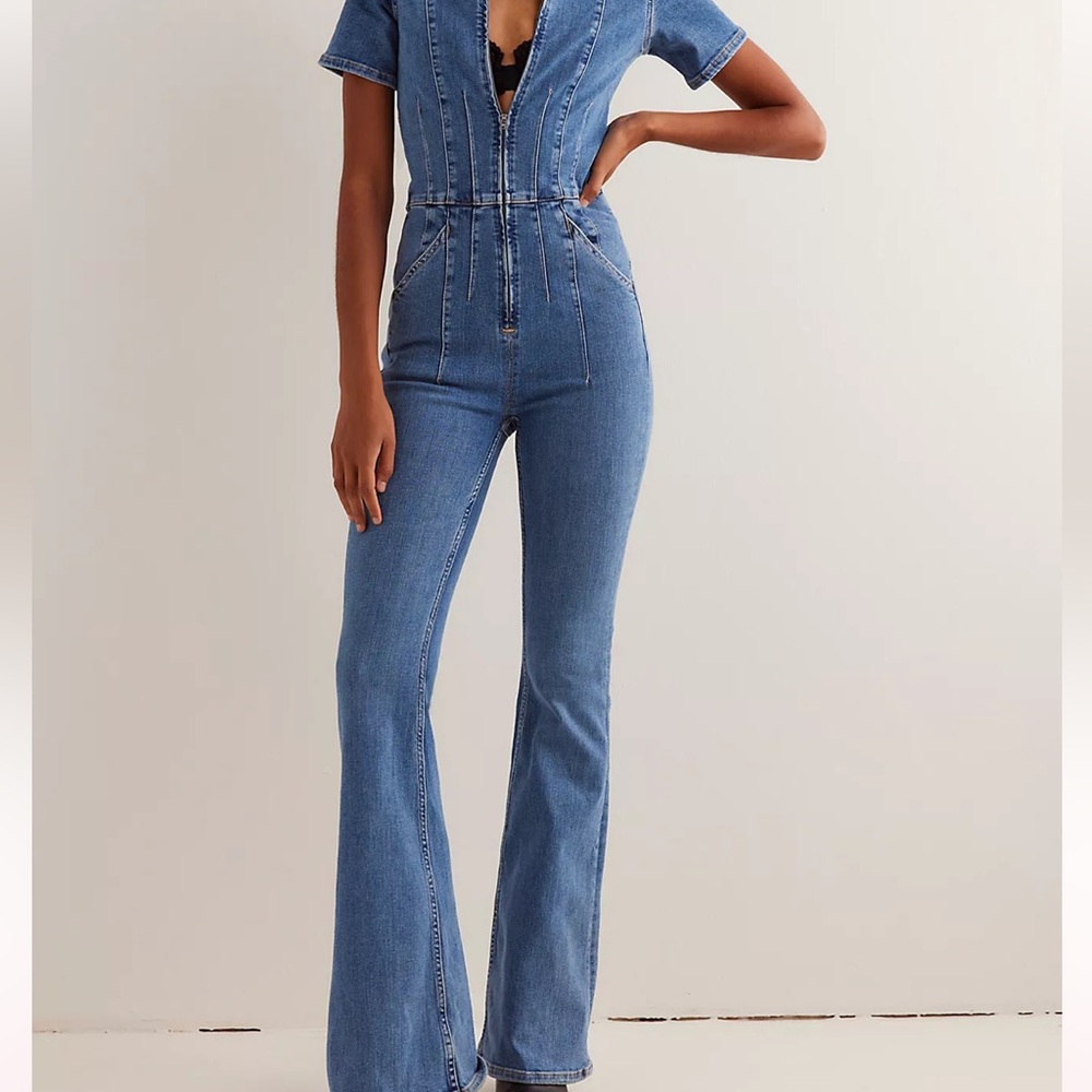 We The FREE.  Free People Blue Denim Jumpsuit